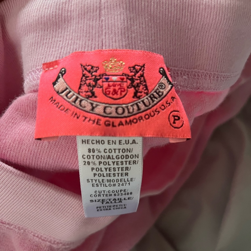 These are original Juicy Couture Sweats. No rips almost brand new. Light Pink.